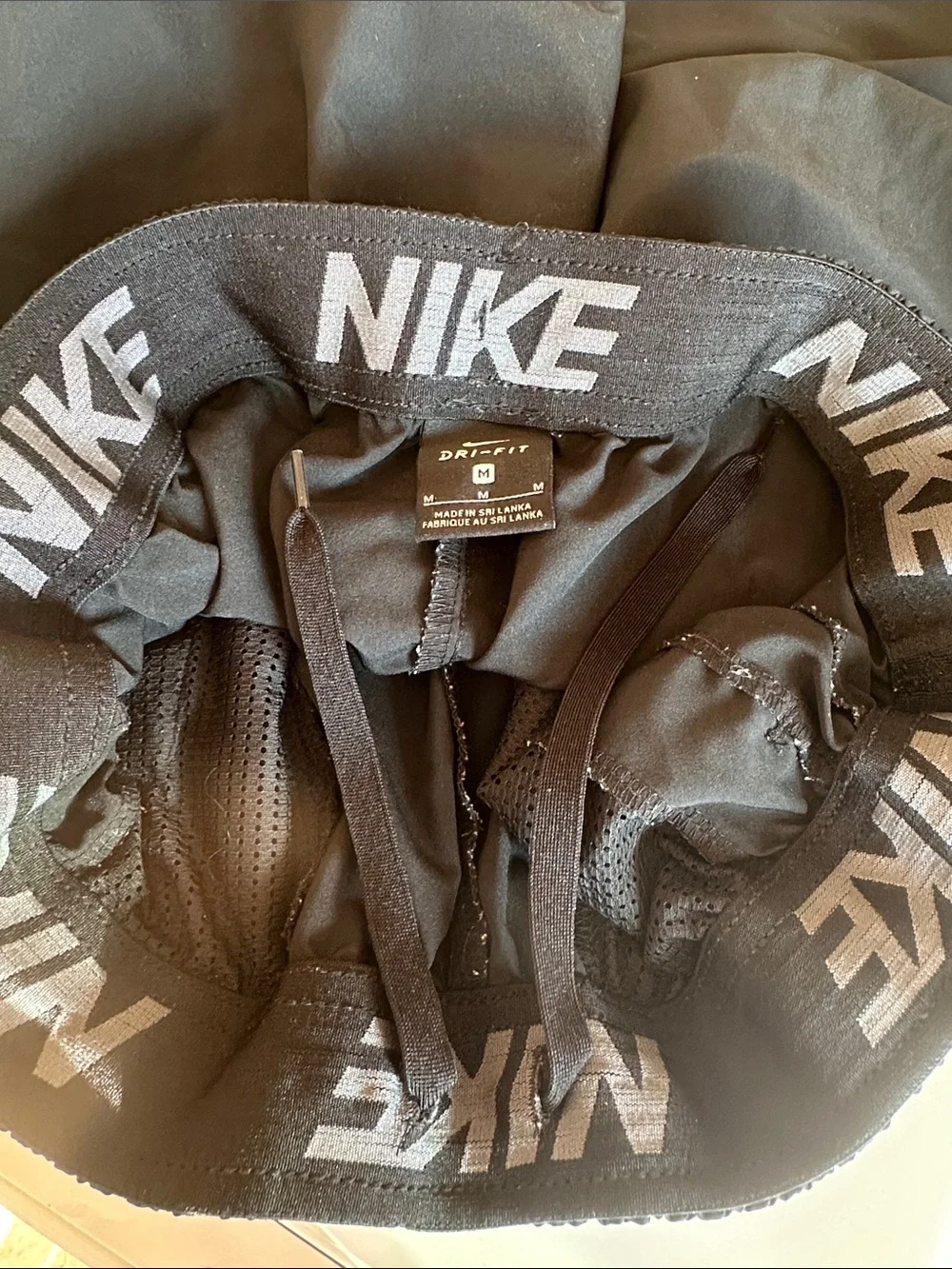 Nike Black Athletic Shorts with Gray Swoosh